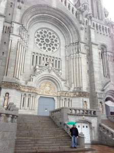 Dennis standing in front of Saint Anne de Beaupre Church